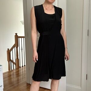 Elegant Black Silk Midi Dress with Flowy Silhouette